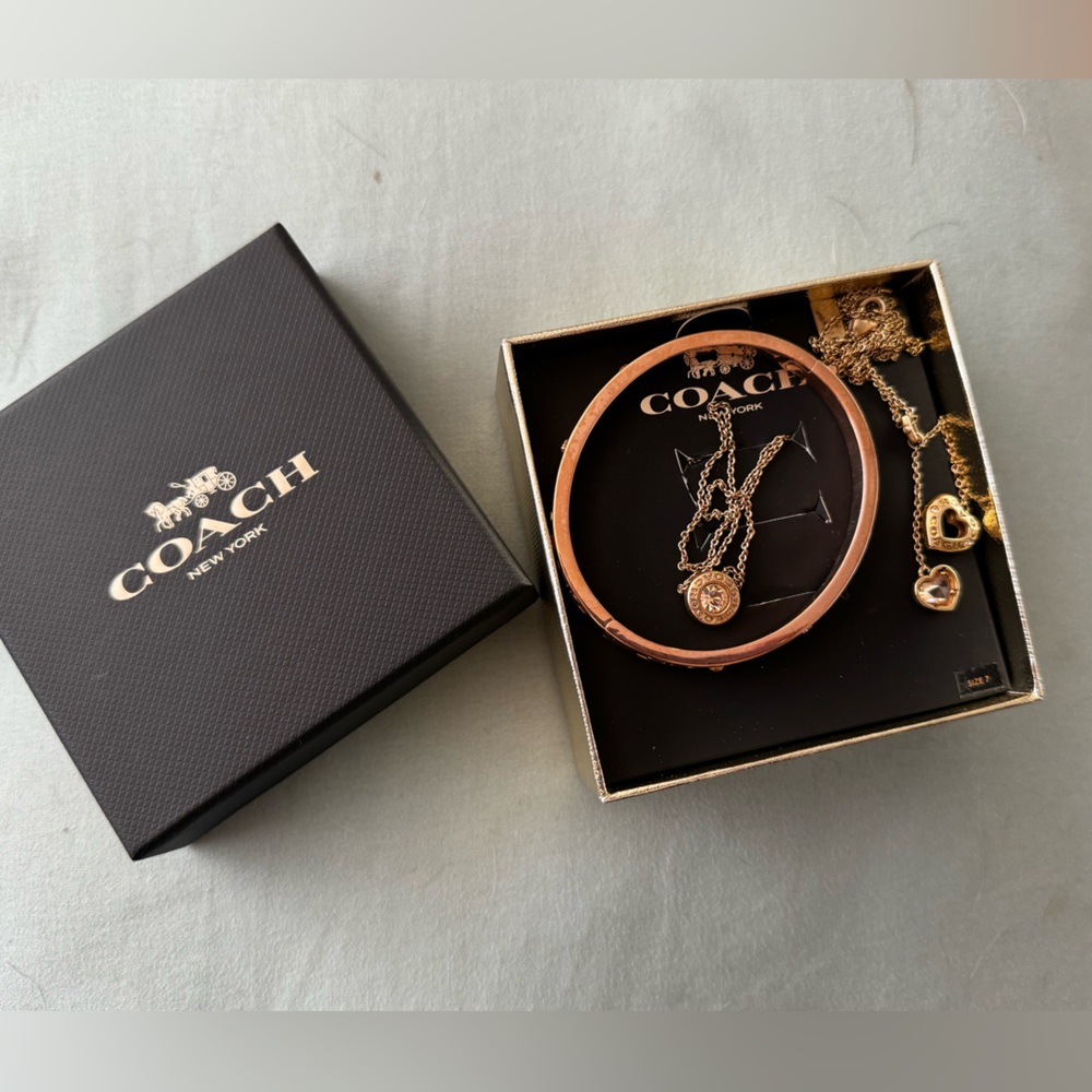 Coach two necklace and one bracelet set